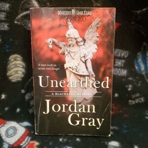 Unearthed by Jordan Gray Mystery Novel 🌏5/$10🌏